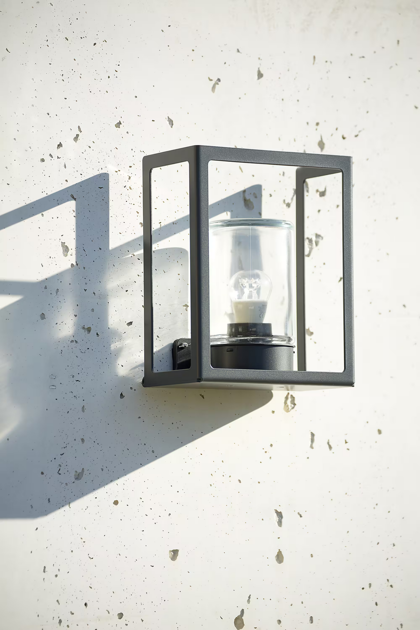 Hugy Clear Glass Decorative Multi-Position Light