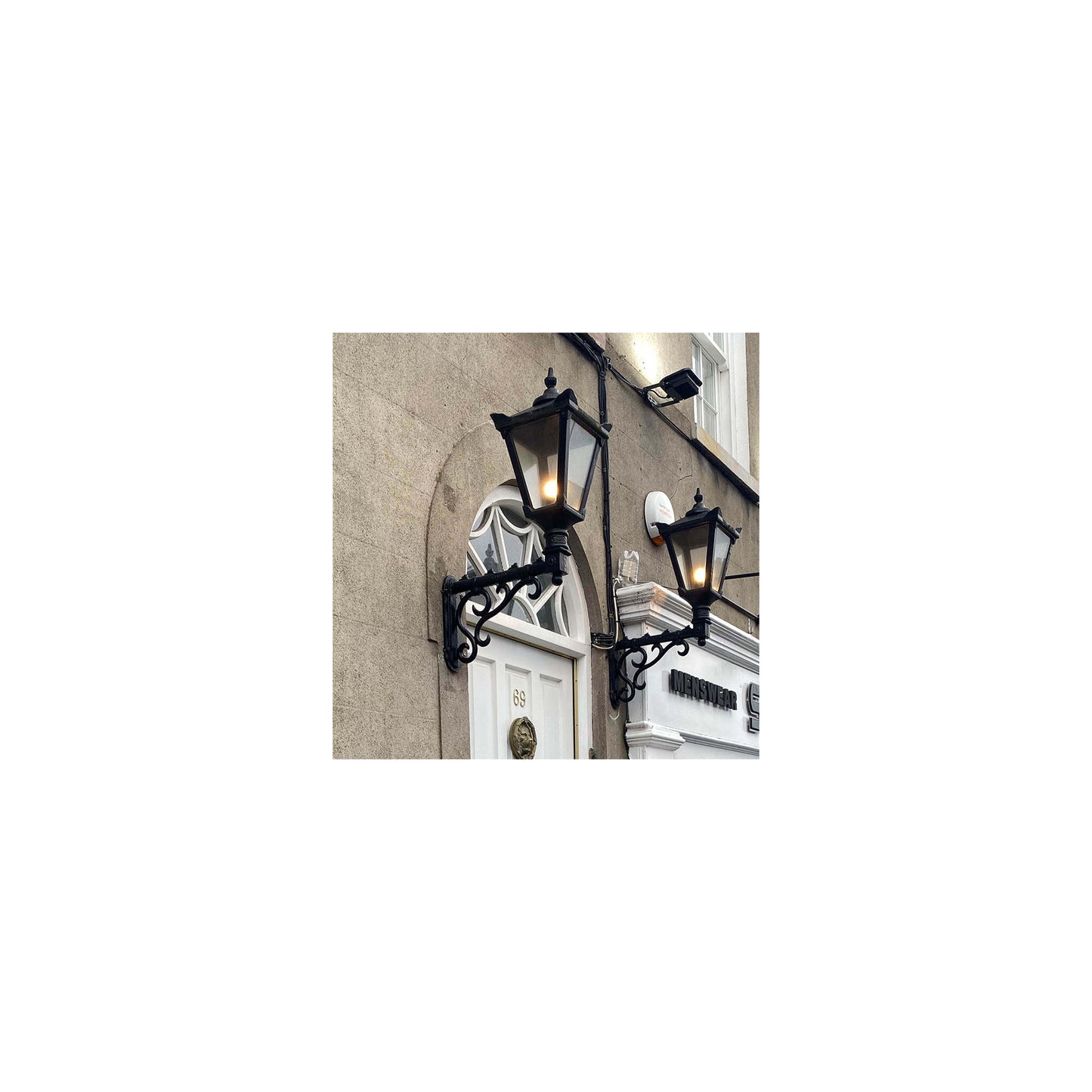 Victorian traditional cast iron wall light with decorative arm 1.1m