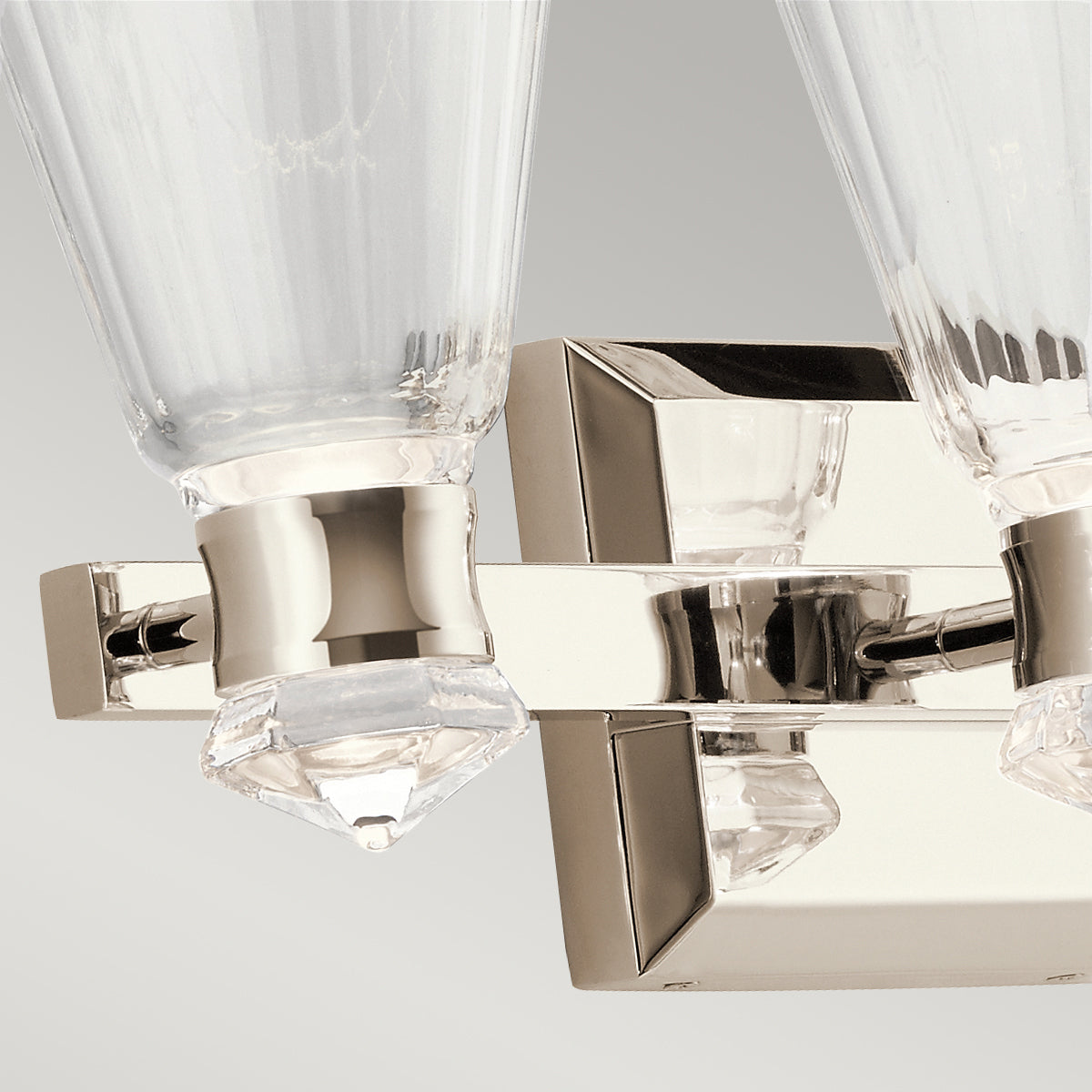 Quintiesse Kayva Dual‑Lit Three‑Arm Wall Light